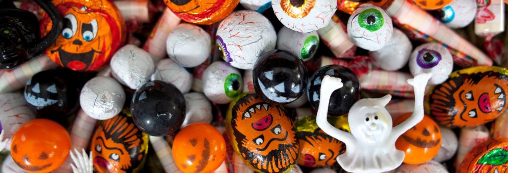 Assortment of Halloween candies that can be dangerous or toxic for pets